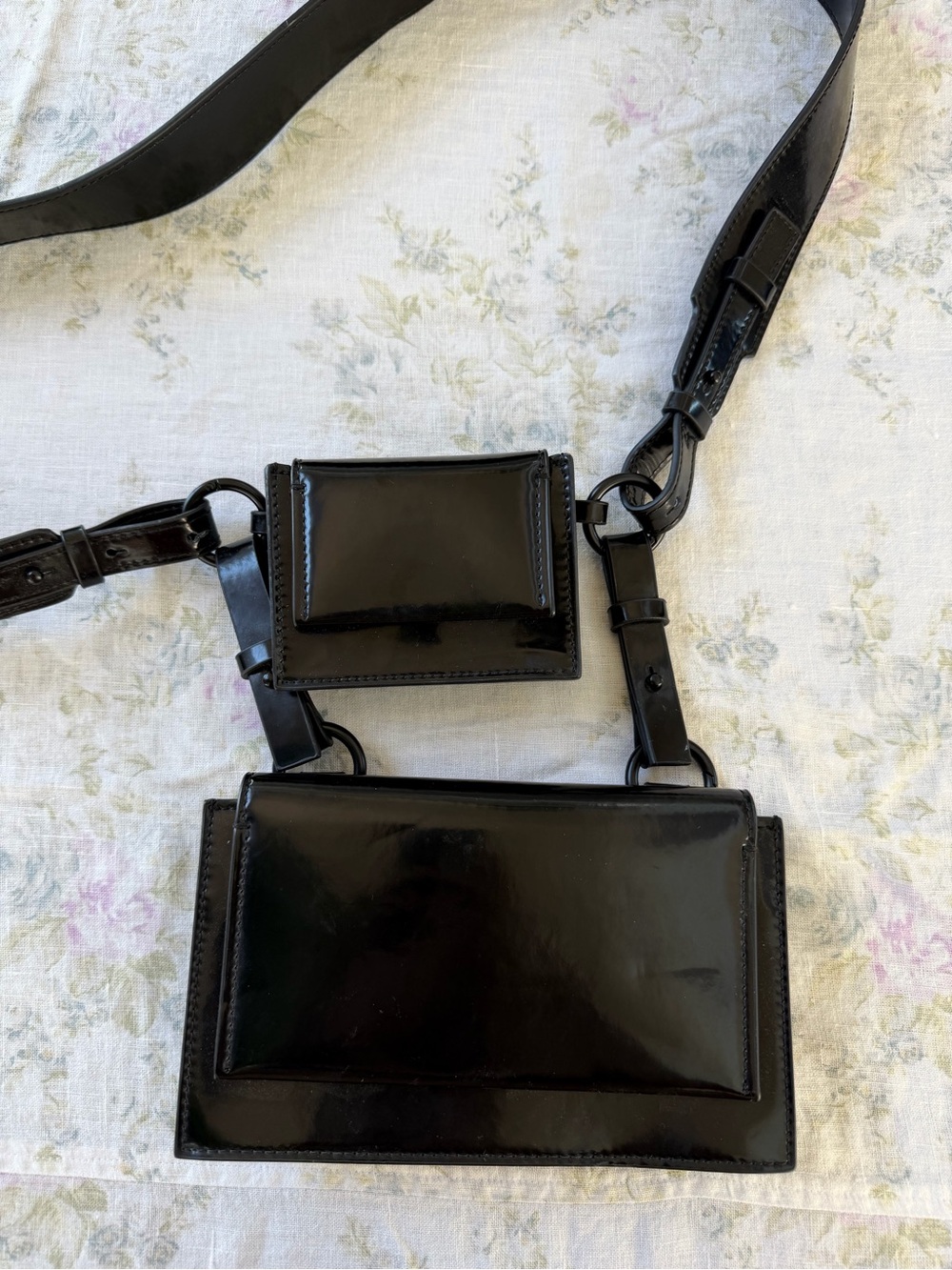 Alpha 60 Sleek Patent Leather Crossbody Bag in Black